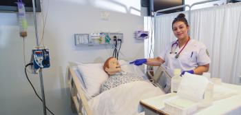 Student with Dummy on Medical Practice