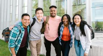 college students smiling and posing for photos