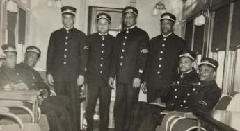 black and white photo of 8 sleeping car porters