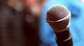 artistic photo of microphone on stand