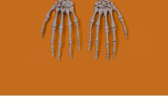 skeleton hands on orange background
