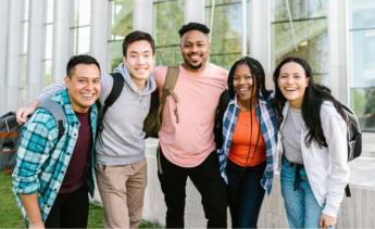 college students smiling and posing for photos