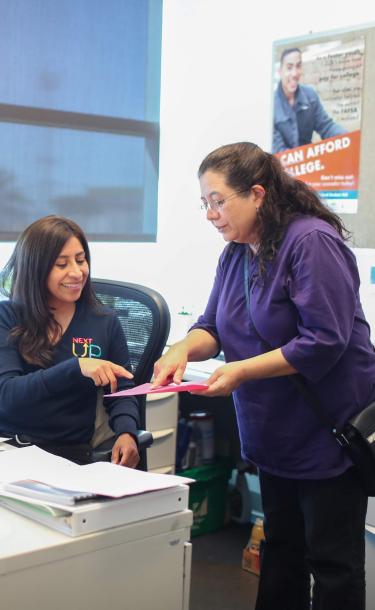 School Counselor Advising an Adult Student.