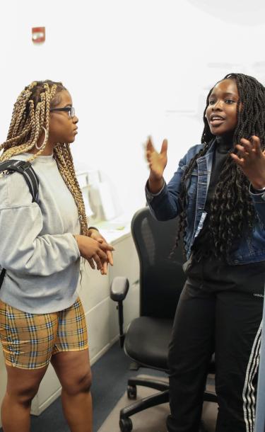 Two Students Talking on Office