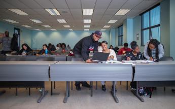 Students in Class in a Laptop