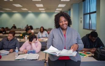 Academic Student With Book in Hands