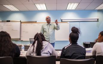 Professor Teaching in Front of the Class