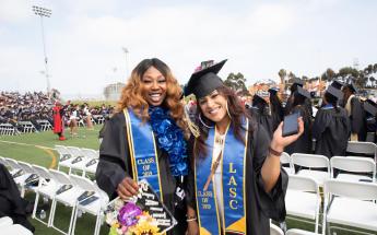 Graduated Students with Decorative Hats