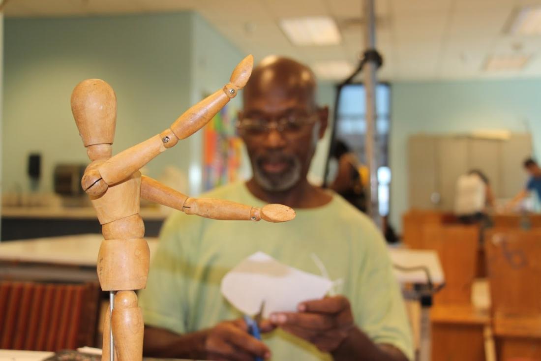 Man Working with Dummy Doll Model