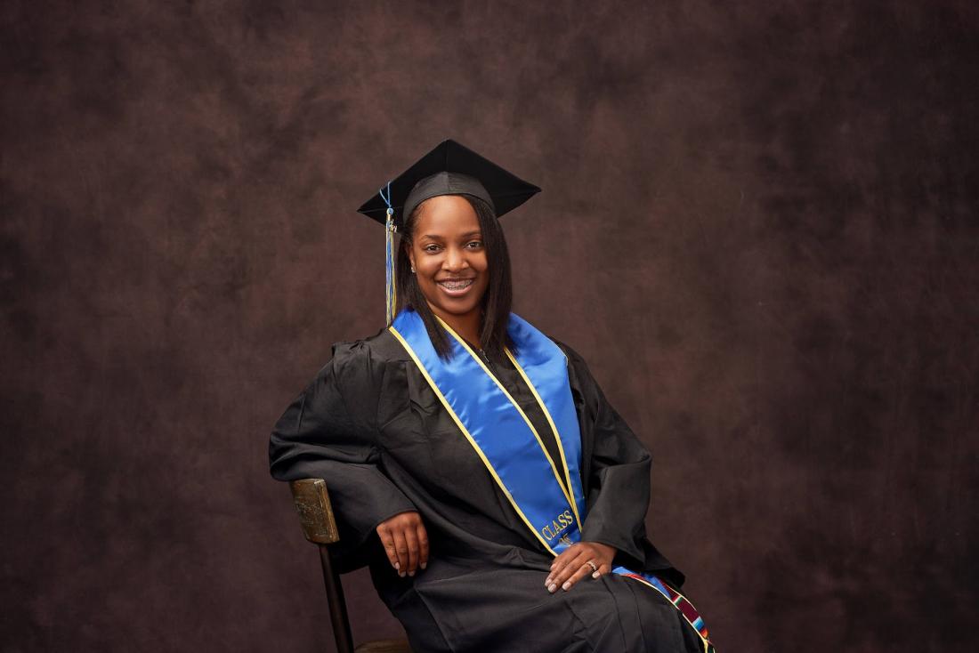 Recent Graduate Woman Looking at the Camera