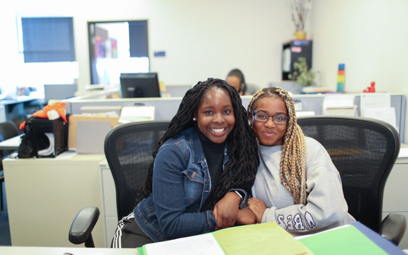 Two Women Smiling at the Camera