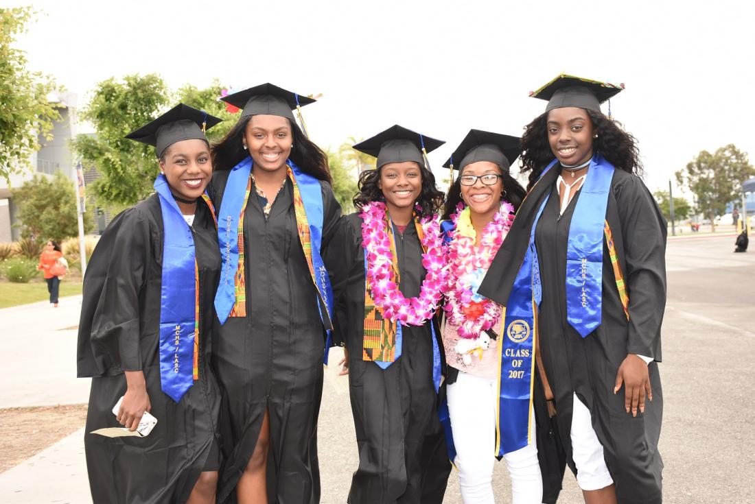 Graduated Students Smiling for the Picture