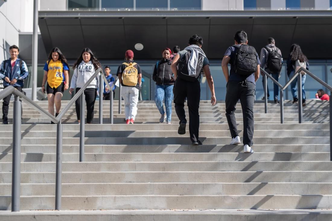Students Walking on The Stairs