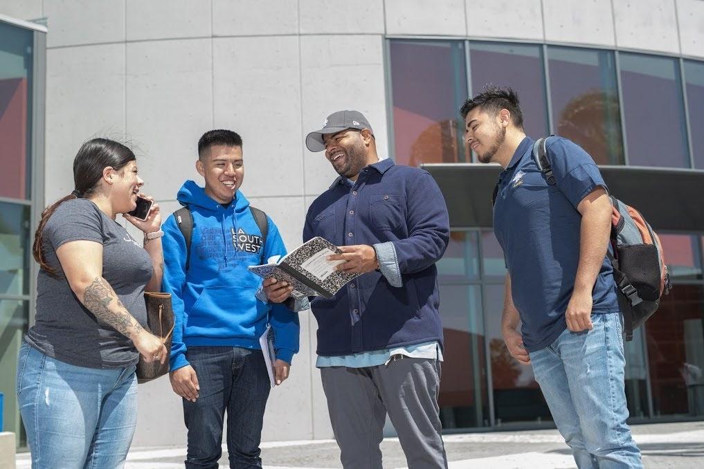 Four Students Smiling