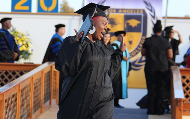 Lady Running with Diploma