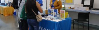 Dream Resource Center employees talk to students at event